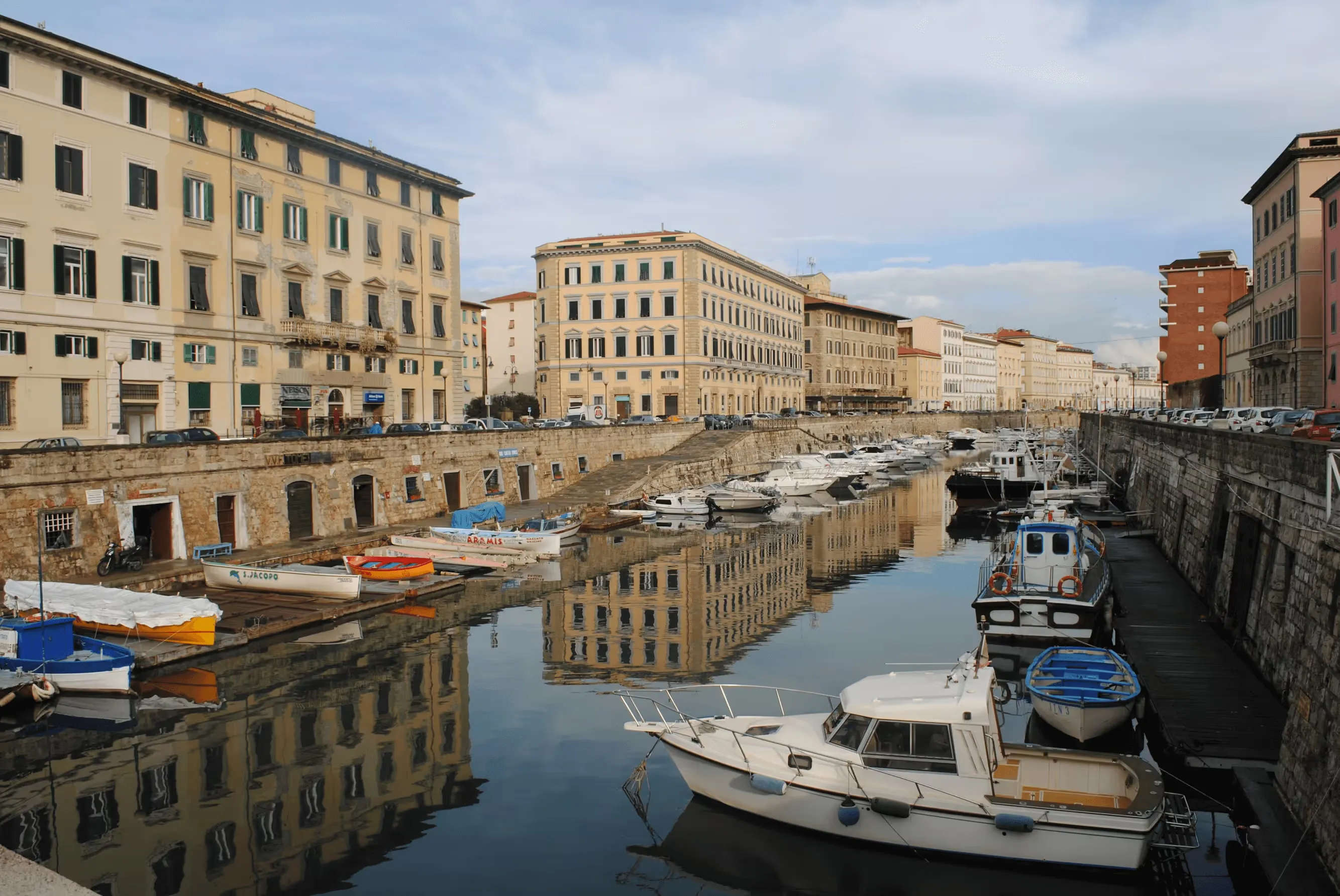Canal-side buildings and boats in Livorno